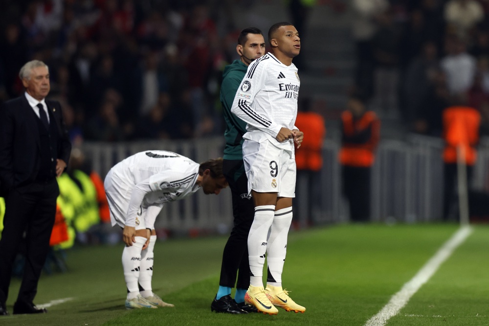 real-madrid-perde-para-lille-em-estreia-de-endrick-como-titular;-liverpool-e-benfica-brilham-na-liga-dos-campeoes