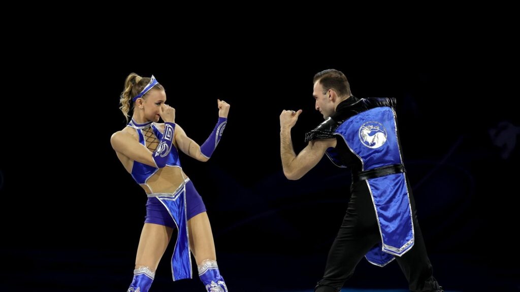 mortal-kombat-rouba-a-cena-nas-olimpiadas-com-patinadores-de-sub-zero-e-kitana